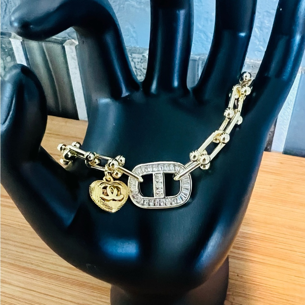 Elegant Gold and Silver Bracelet with Heart Charm